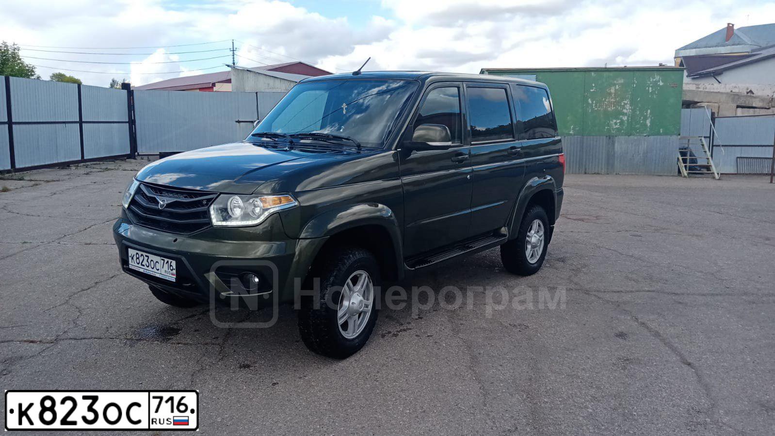 Фото автомобиля UAZ 3163 PATRIOT, 2014 — госномер К823ОС716. Цвет: ЗОЛОТ ЛИСТ МЕТАЛЛИК