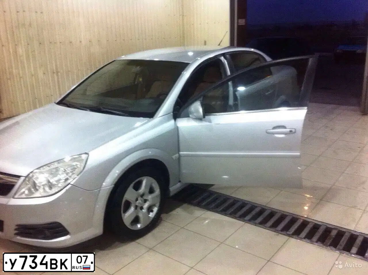 Фото автомобиля OPEL VECTRA, 2005 — госномер Н328РТ126. Цвет: СЕРО-ГОЛУБОЙ