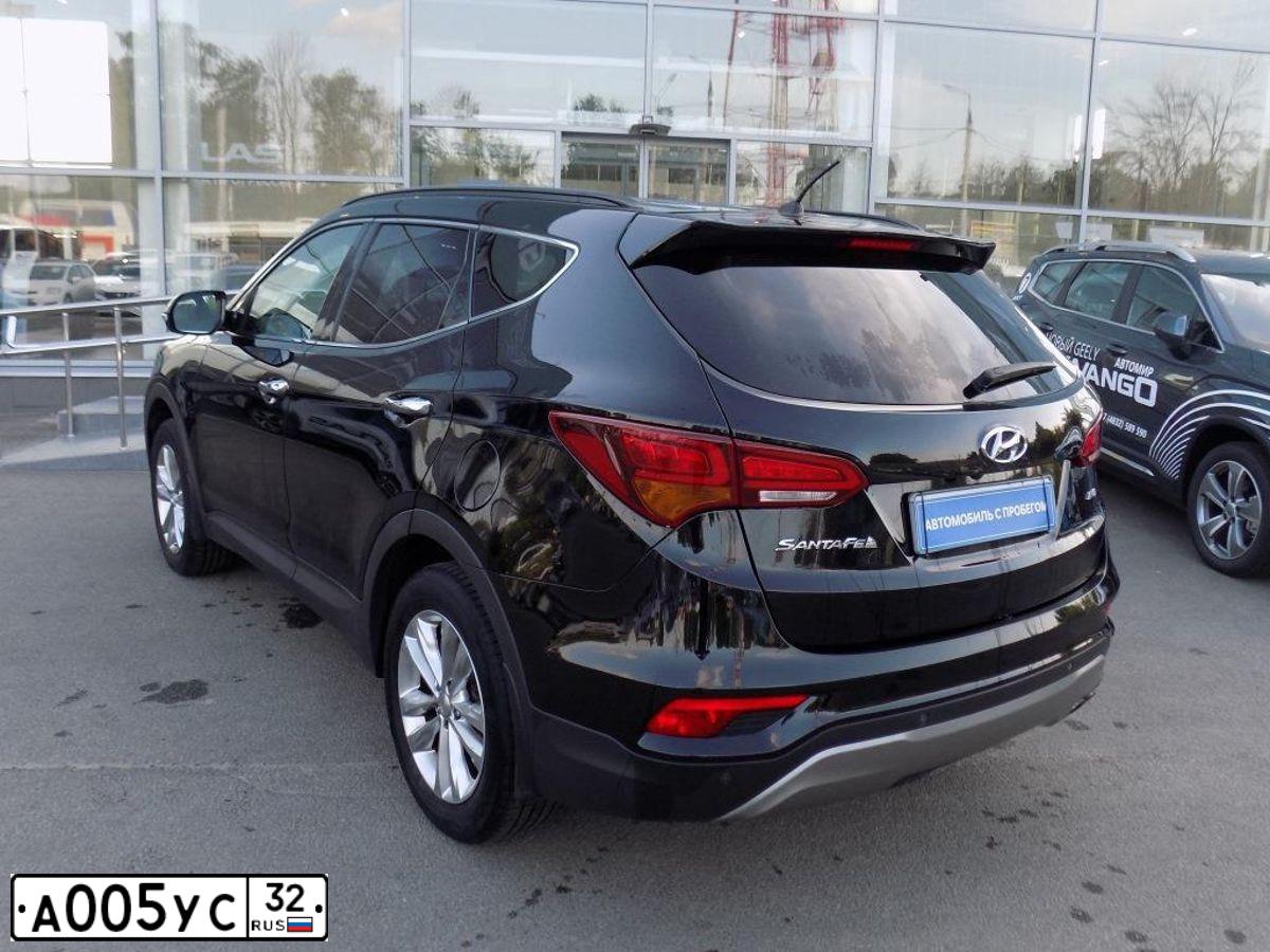 Фото автомобиля HYUNDAI IX35, 2011 — госномер Н190КА32. Цвет: ЧЕРНЫЙ