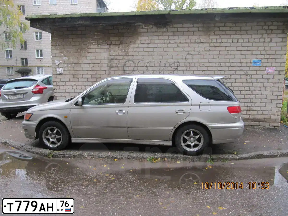 Фото автомобиля FORD FOCUS, 2011 — госномер Т779АН76. Цвет: СЕРЫЙ