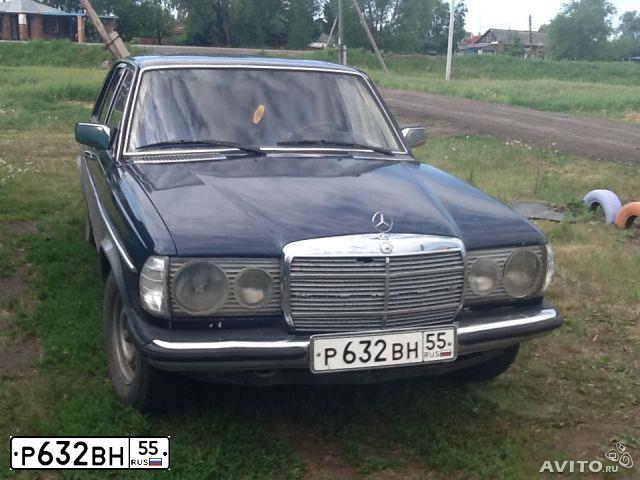 Фото автомобиля MERCEDES E-KLASSE, 1981 — госномер Н405НР55. Цвет: ТЕМНО-СИНИЙ