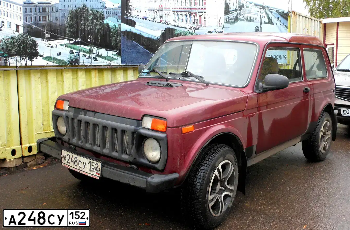 Фото автомобиля LADA 2112, 2005 — госномер А248СУ152. Цвет: КРАСНЫЙ