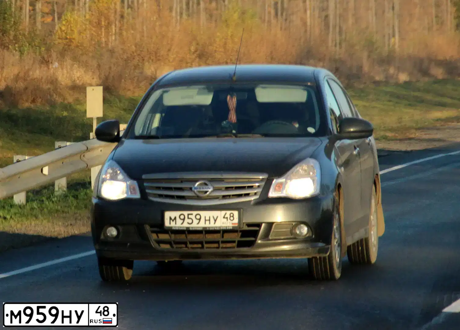 Фото автомобиля NISSAN ALMERA /AVTOVAZ/, 2013 — госномер М595НУ48. Цвет: ЧЕРНЫЙ