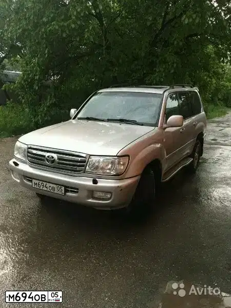Фото автомобиля TOYOTA LANDCRUISER, 2000 — госномер М694ОВ05. Цвет: ЗЕЛЕНЫЙ