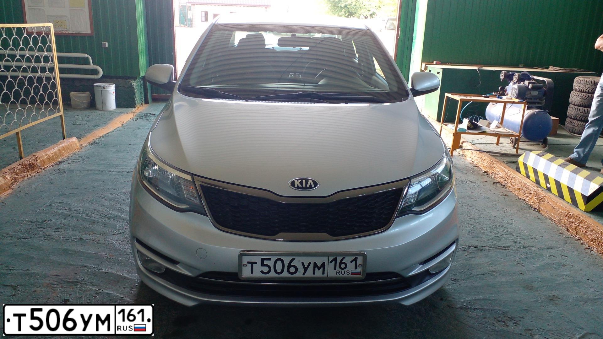 Фото автомобиля KIA RIO, 2015 — госномер Т506УМ161. Цвет: СЕРЫЙ СВЕТЛЫЙ