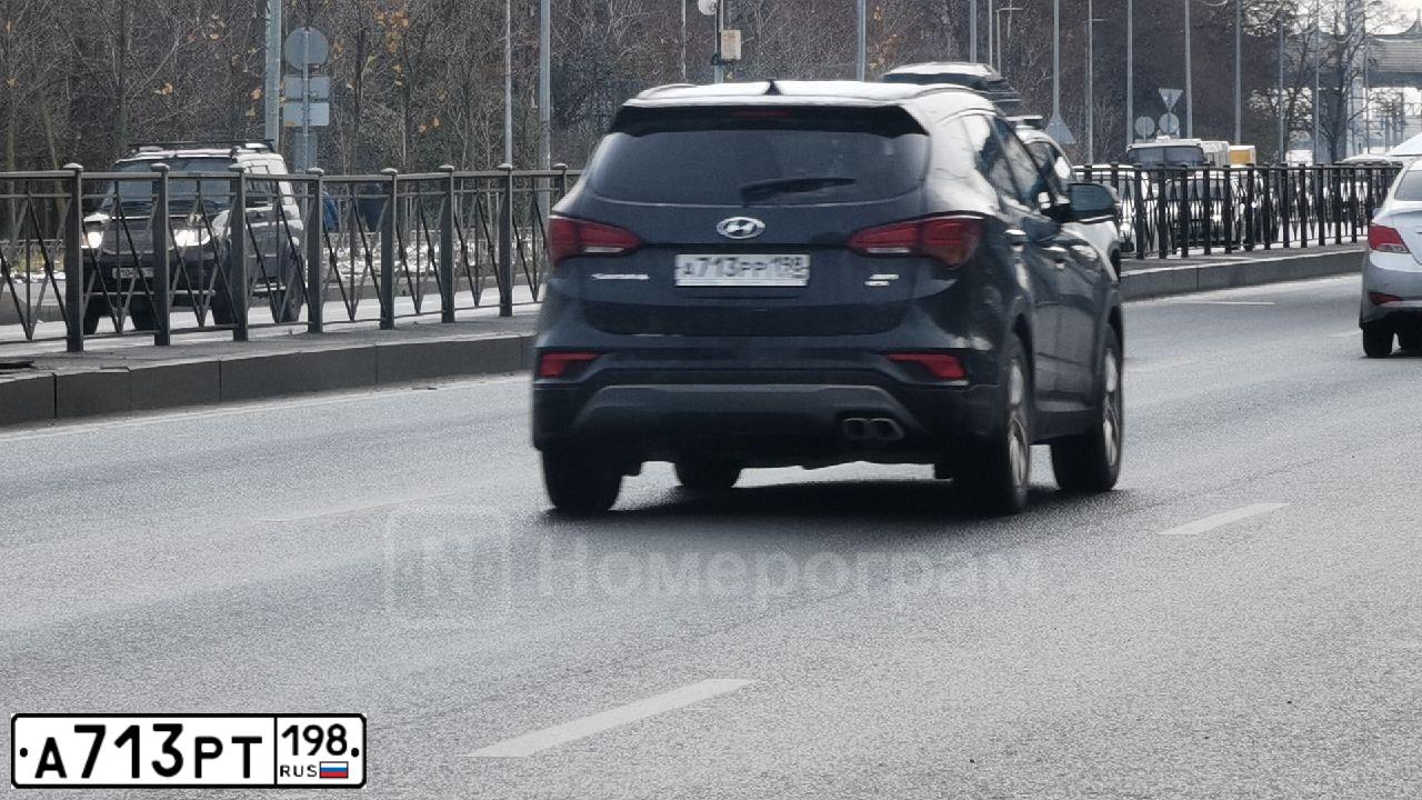 Фото автомобиля KIA SORENTO, 2018 — госномер А713РТ198. Цвет: ЧЕРНЫЙ