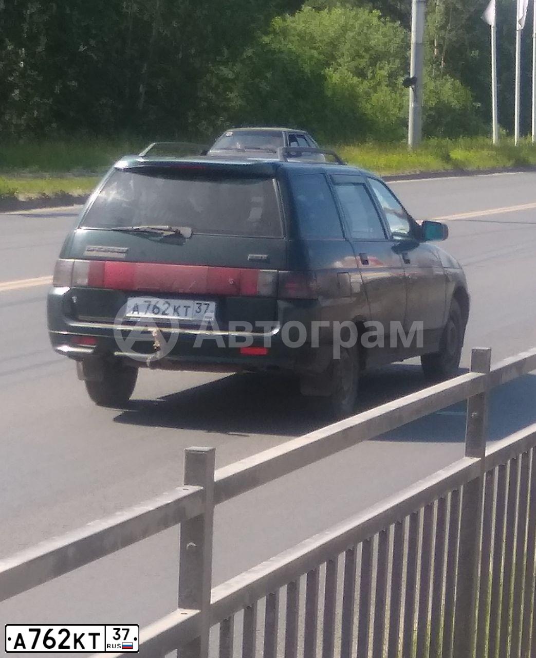 Фото автомобиля LADA 2111, 2004 — госномер А762КТ37. Цвет: ТЕМНО-ЗЕЛЕНЫЙ