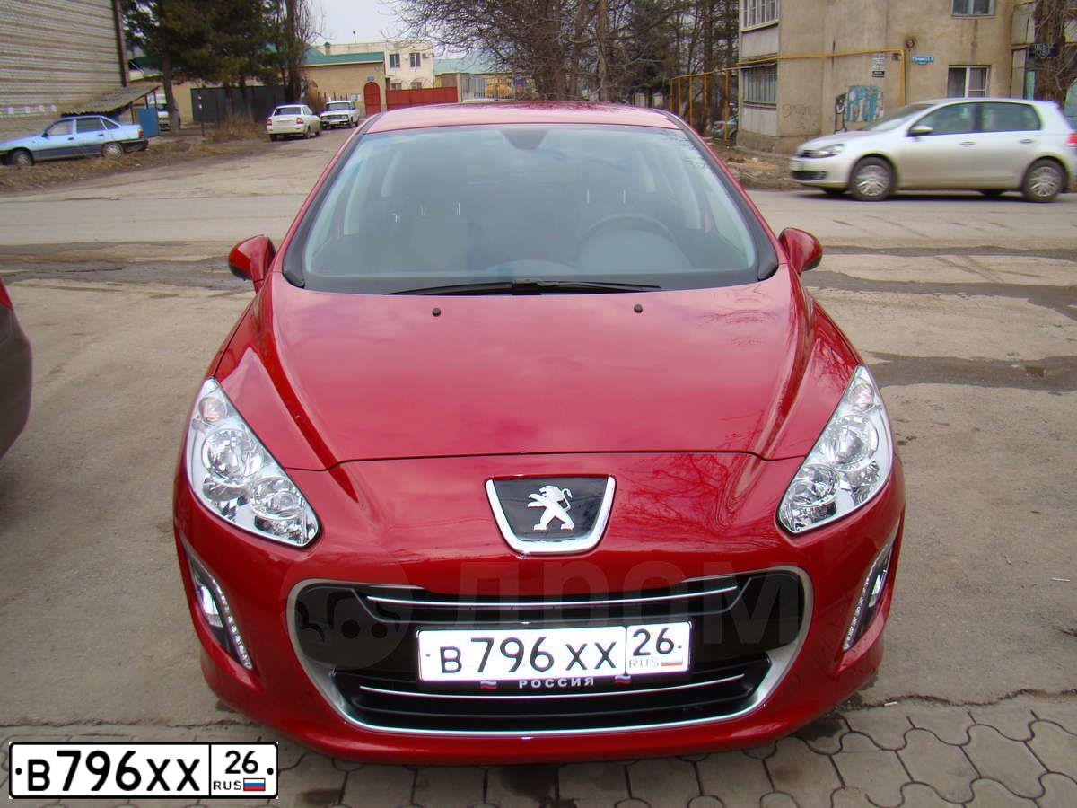 Фото автомобиля PEUGEOT 308, 2011 — госномер Н308МХ26. Цвет: Красный
