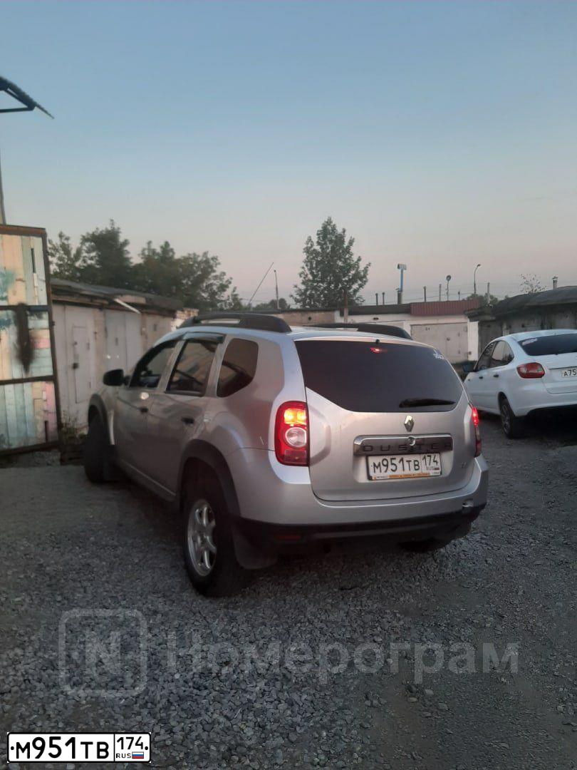 Фото автомобиля RENAULT DUSTER, 2015 — госномер М951ТВ174. Цвет: СВЕТЛО-СЕРЫЙ