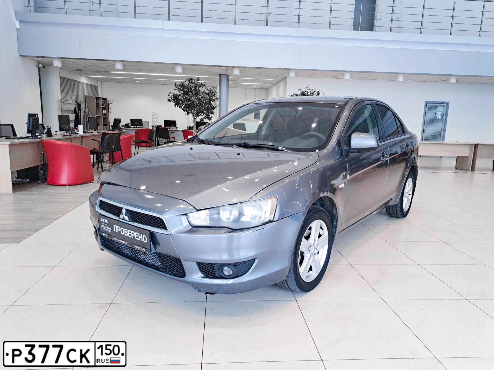 Фото автомобиля MITSUBISHI LANCER, 2008 — госномер М191ТР13. Цвет: Серый