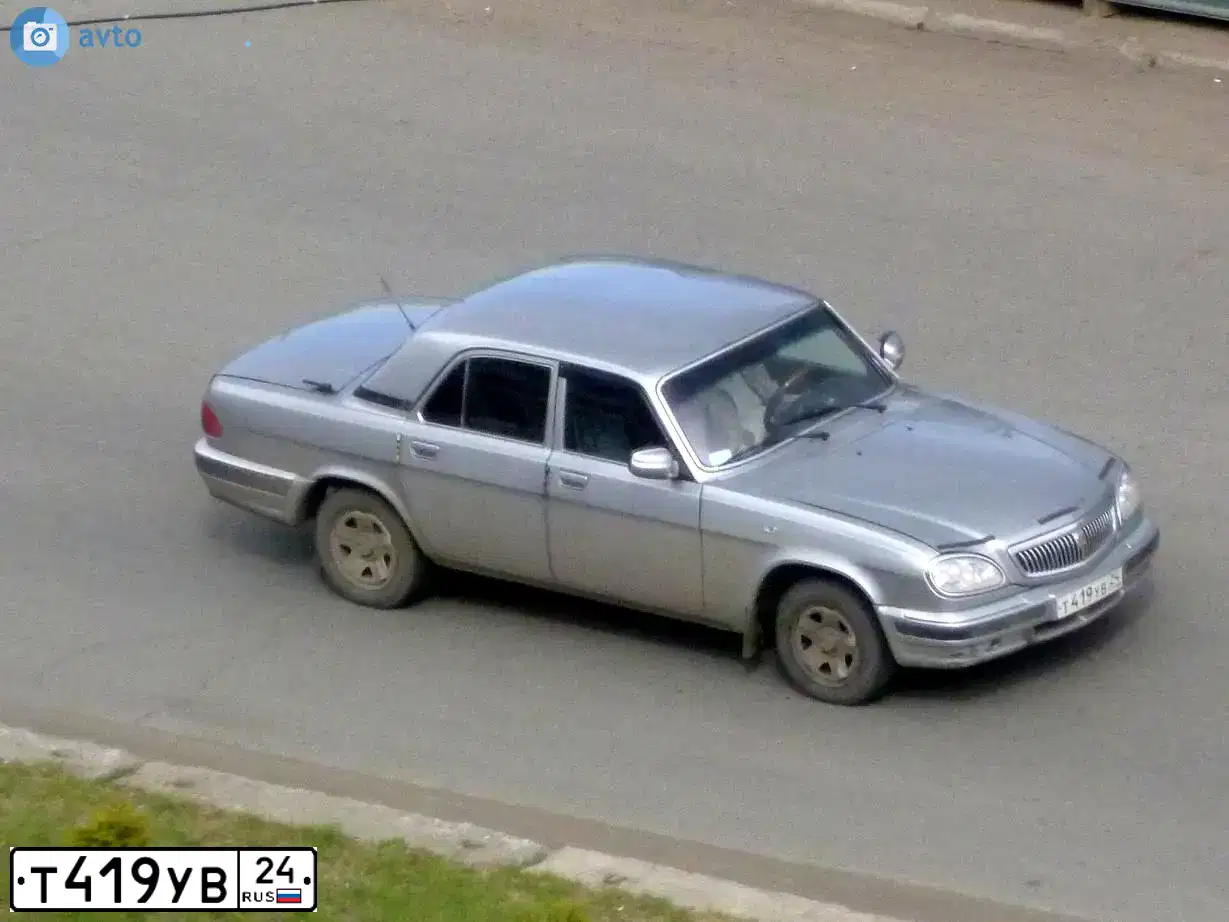 Фото автомобиля GAZ 3110 WOLGA, 2005 — госномер О221РЕ124. Цвет: СЕРЫЙ