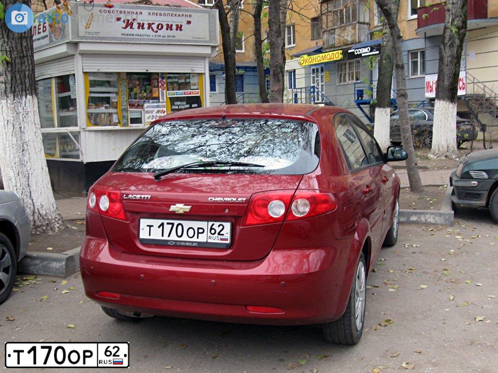 Фото автомобиля CHEVROLET LACETTI, 2006 — госномер Т170ОР62. Цвет: ТЕМНО-КРАСНЫЙ