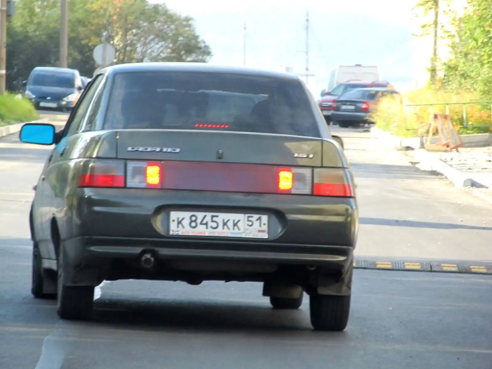 Фото автомобиля ВАЗ 21101, 2006 — госномер Е184ОЕ51. Цвет: ЗОЛОТИСТЫЙ ТЕМНО-ЗЕЛЕНЫЙ
