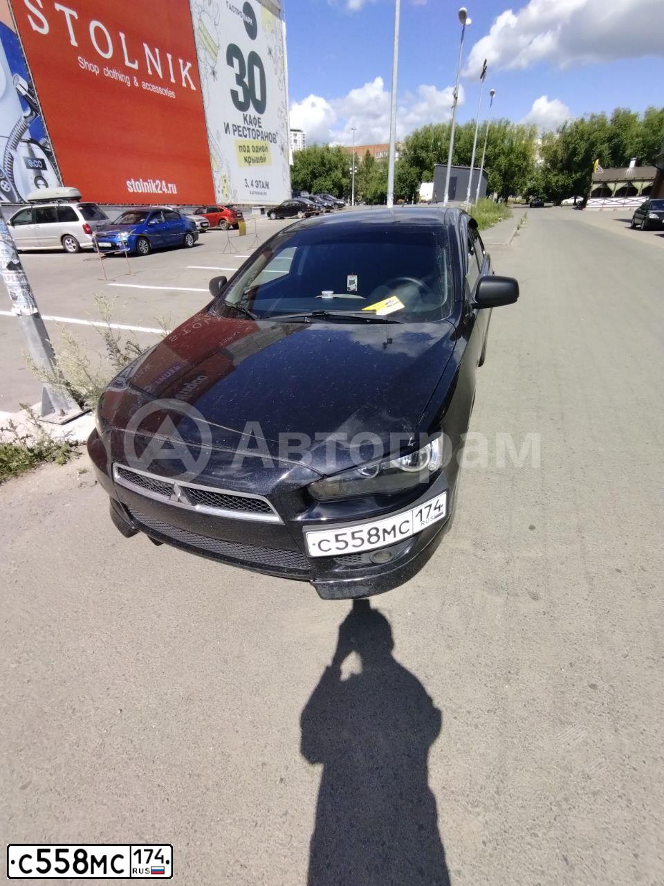 Фото автомобиля MITSUBISHI LANCER, 2010 — госномер С558МС174. Цвет: ЧЕРНЫЙ