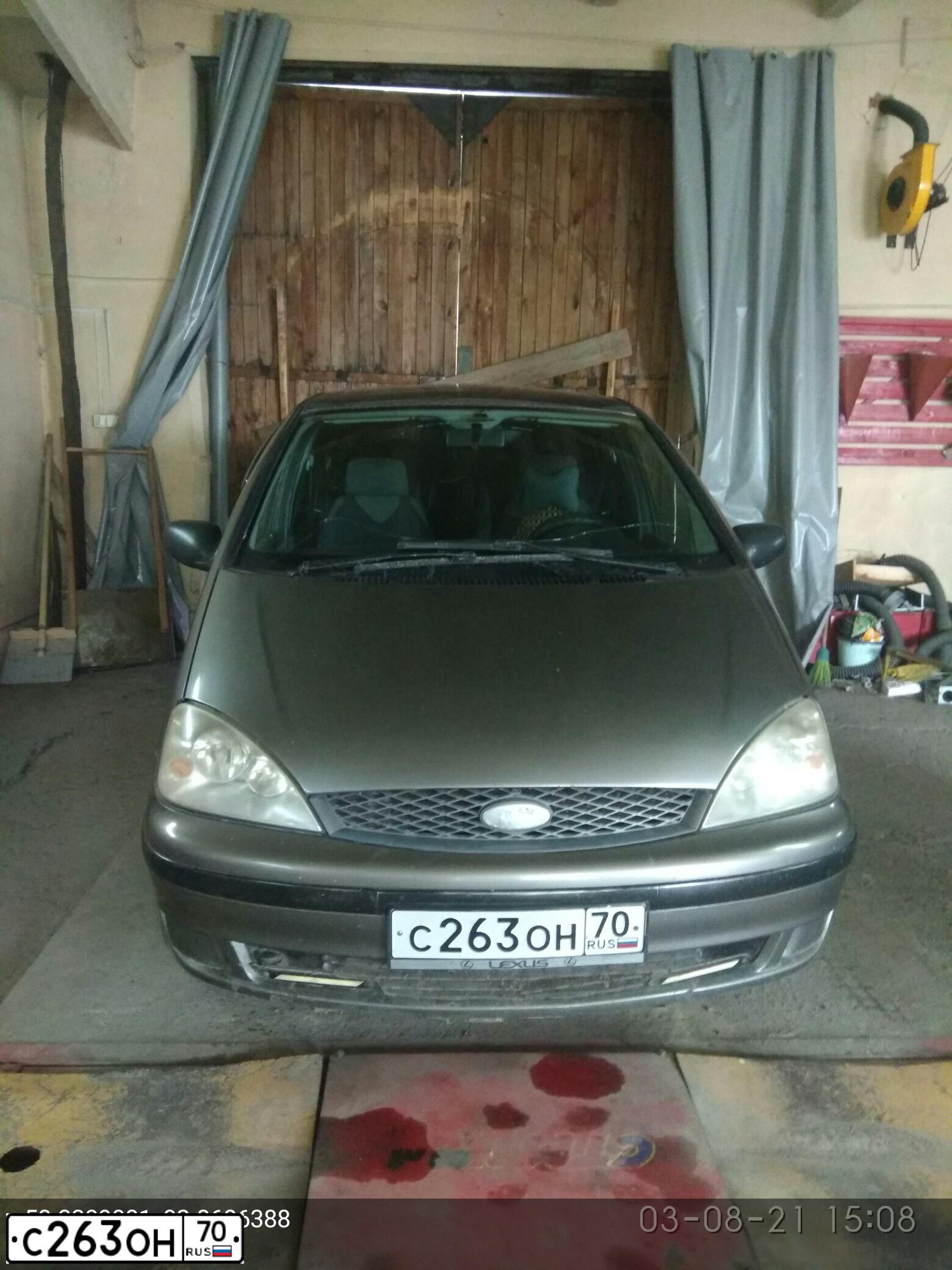 Фото автомобиля FORD GALAXY, 2000 — госномер Н582ЕХ70. Цвет: ТЕМНО-СЕРЫЙ