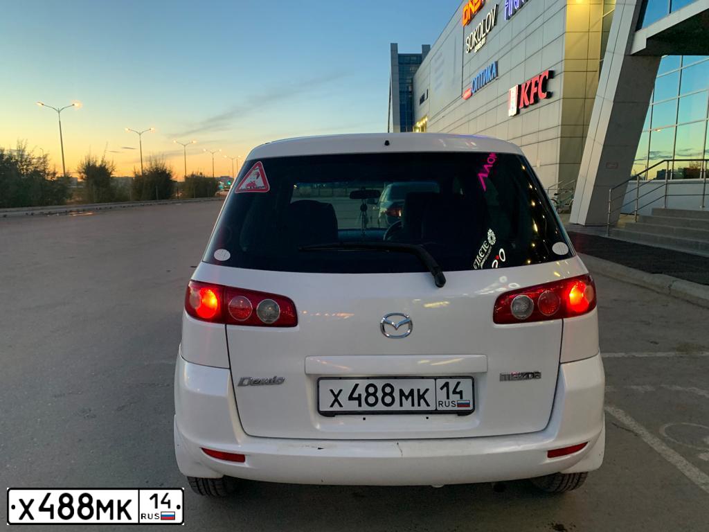 Фото автомобиля MAZDA DEMIO, 2004 — госномер Х488МК14