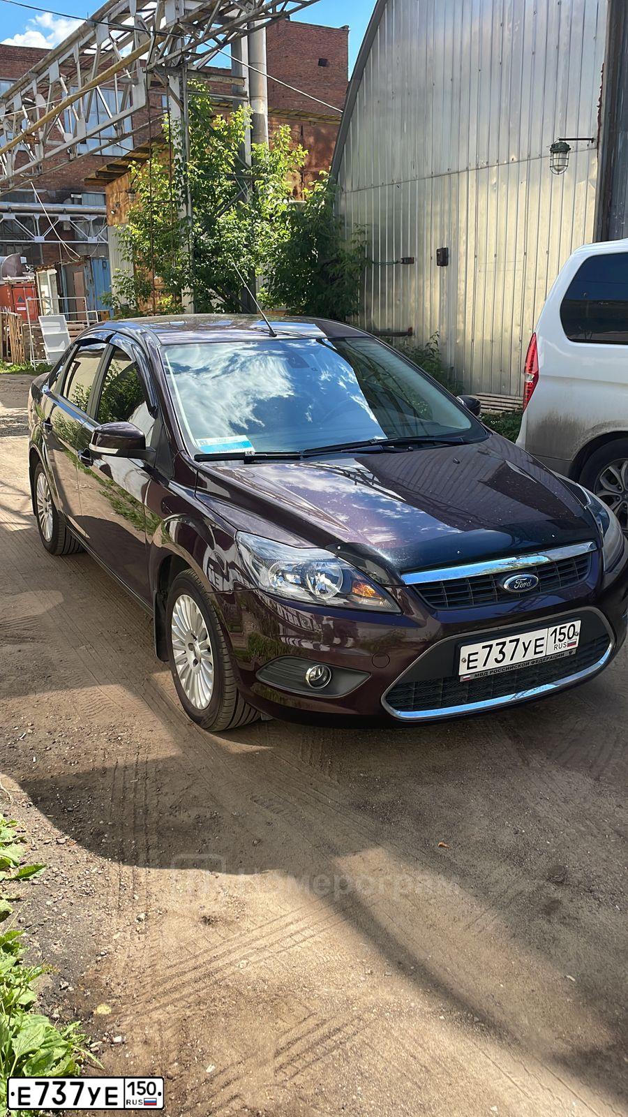 Фото автомобиля FORD FOCUS, 2008 — госномер Х424АК250. Цвет: ФИОЛЕТОВЫЙ