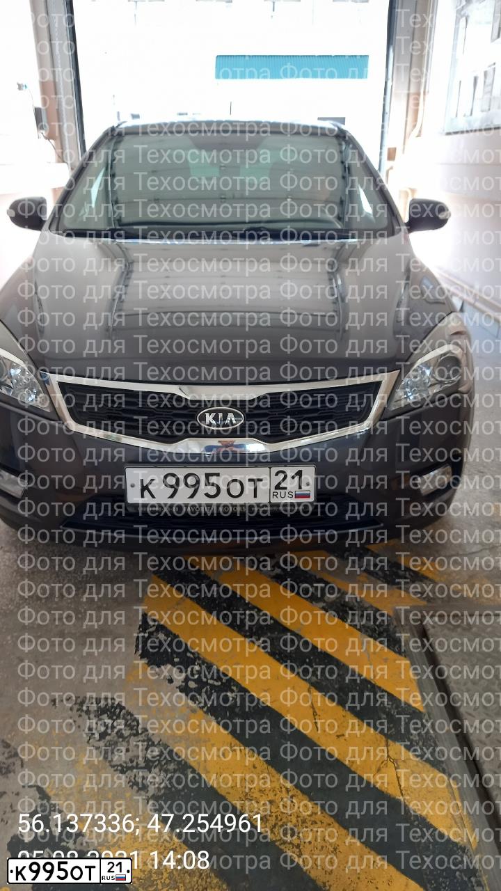 Фото автомобиля KIA CEED, 2011 — госномер Н855МЕ21. Цвет: СЕРЫЙ