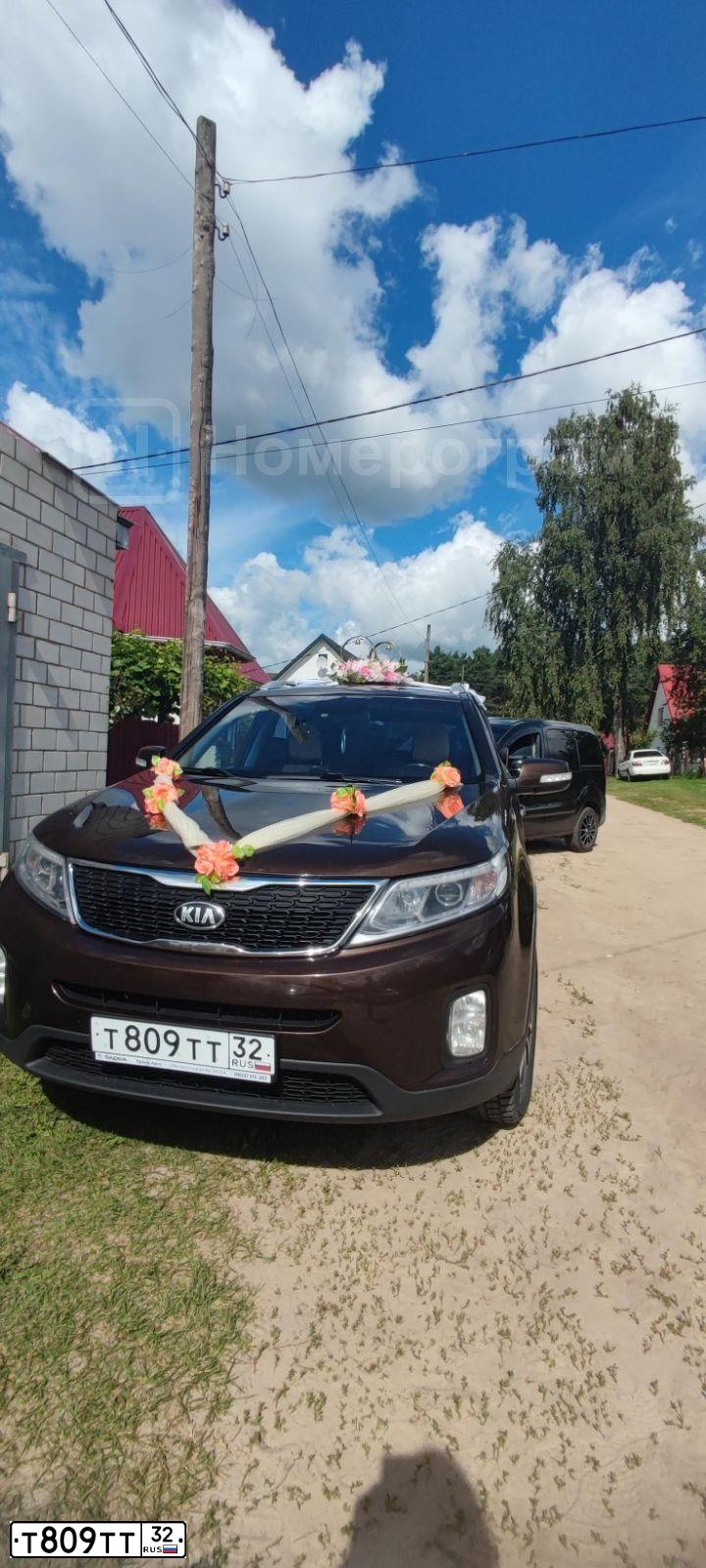 Фото автомобиля KIA SORENTO, 2014 — госномер Т809ТТ32. Цвет: Коричневый