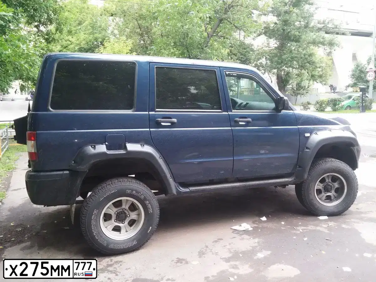 Фото автомобиля UAZ PATRIOT, 2014 — госномер О996ТР69. Цвет: Темно-синий