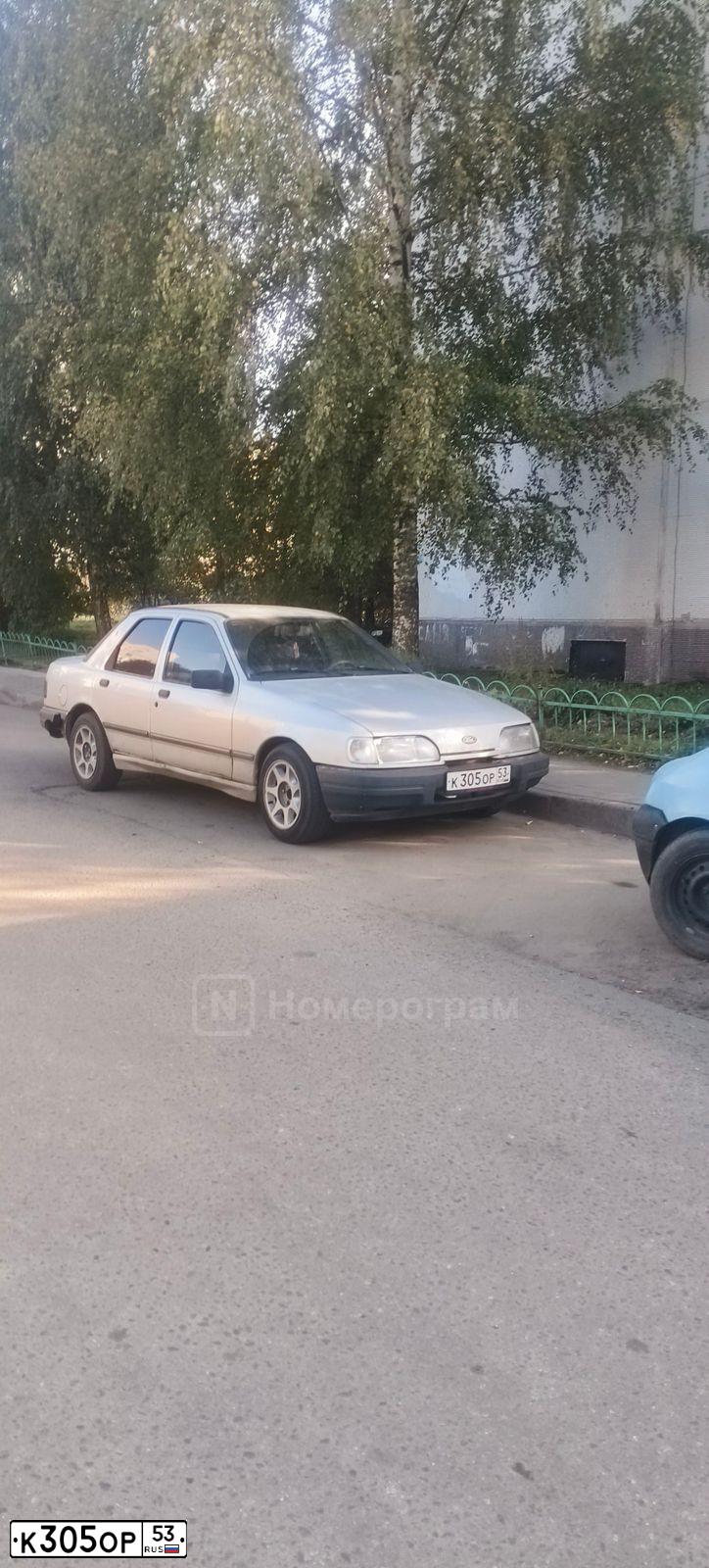 Фото автомобиля FORD D SIERRA, 1988 — госномер К305ОР53. Цвет: СЕРЕБРИСТЫЙ