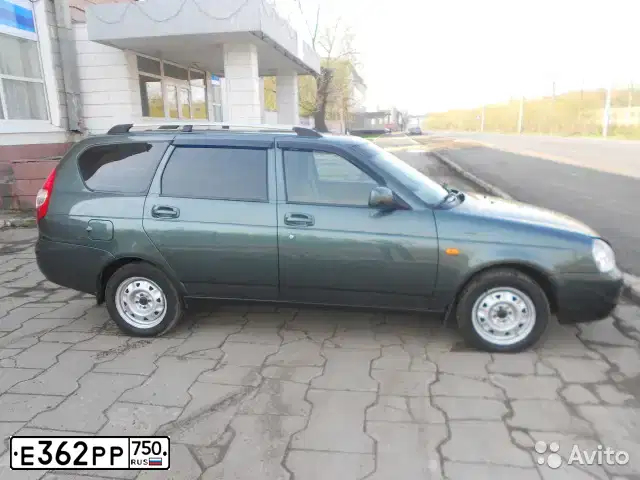 Фото автомобиля LADA 2171 PRIORA, 2010 — госномер Е362РР750. Цвет: СЕРО-СИНЕ-ЗЕЛЕНЫЙ