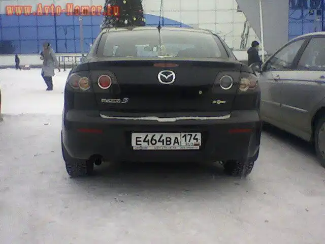 Фото автомобиля MAZDA 3, 2007 — госномер О771ВО774. Цвет: ЧЕРНЫЙ