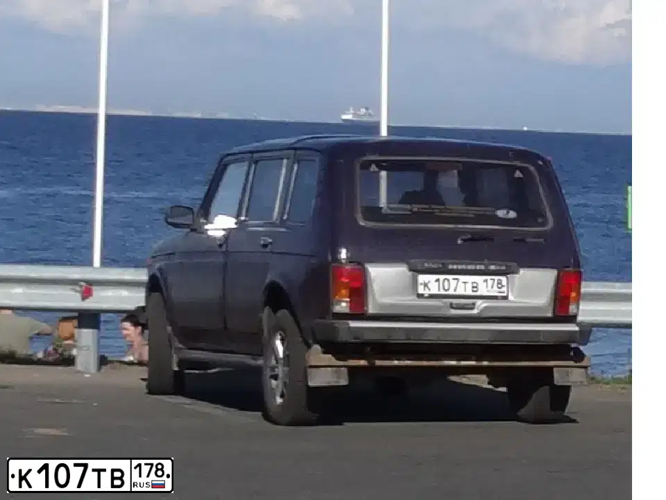 Фото автомобиля LADA 2131 NIVA, 1999 — госномер К107ТВ178. Цвет: ФИОЛЕТОВЫЙ