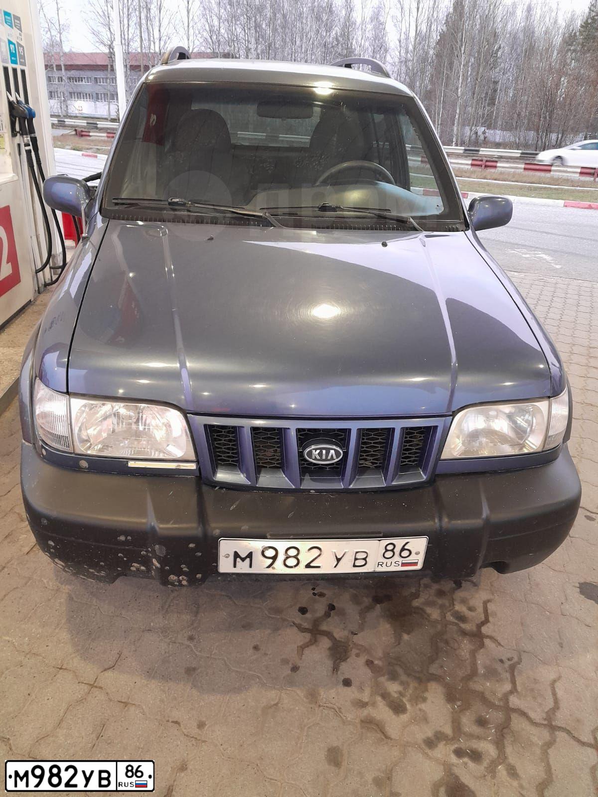 Фото автомобиля KIA SPORTAGE, 2005 — госномер М982УВ86. Цвет: синий