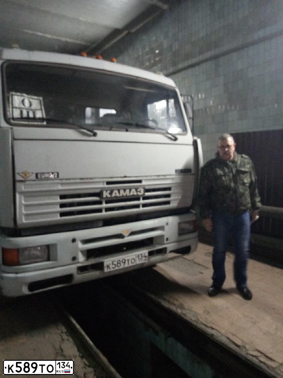Фото автомобиля КАМАЗ 65117, 2006 — госномер У005СР34. Цвет: СВ. ДЫМКА
