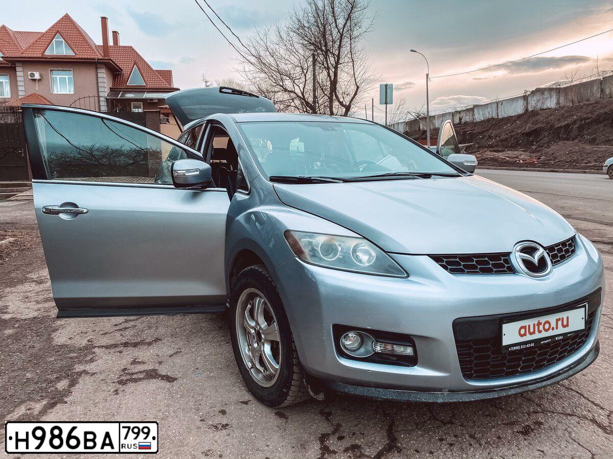 Фото автомобиля MAZDA CX-7, 2008 — госномер Е323НЕ164. Цвет: СЕРЕБРИСТЫЙ