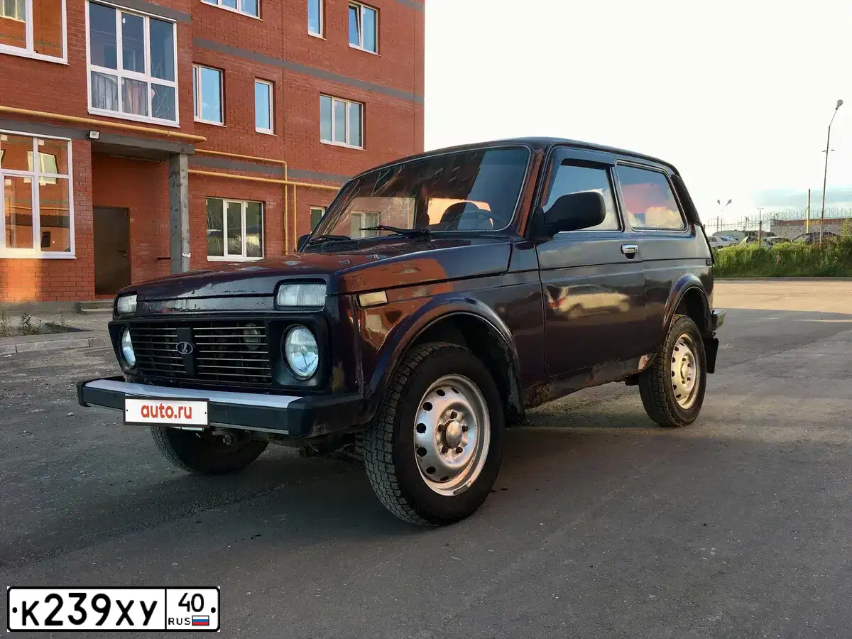 Фото автомобиля LADA 2121 NIVA, 2004 — госномер Т234ВА71. Цвет: ТЕМНО-БОРДОВЫЙ