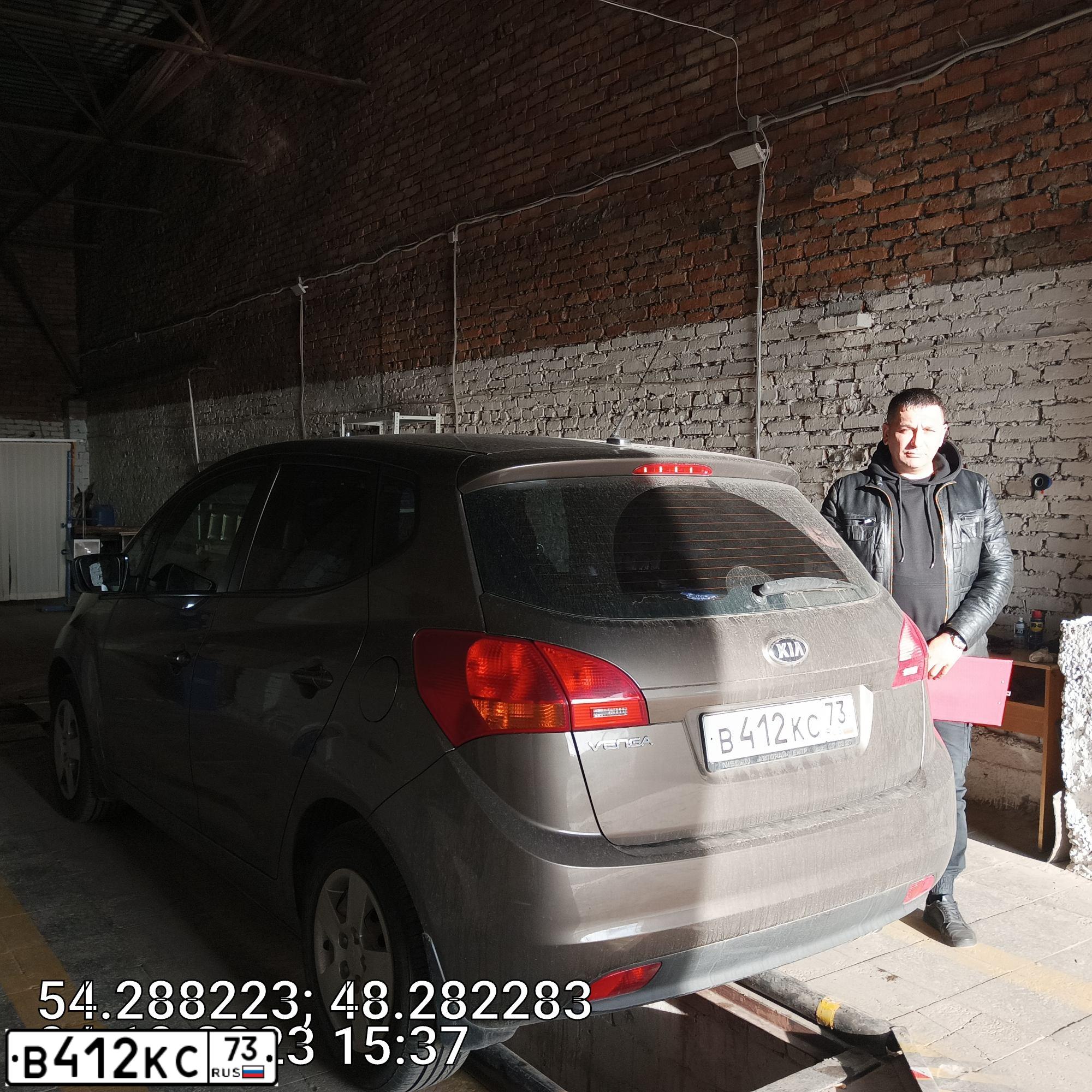 Фото автомобиля KIA VENGA, 2014 — госномер В412КС73. Цвет: Коричневый