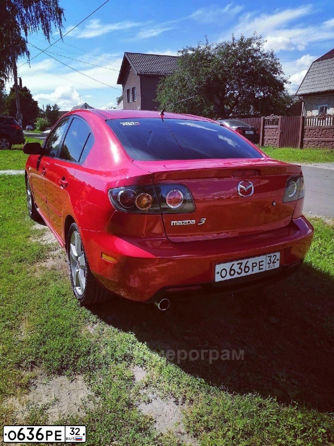 Фото автомобиля MAZDA A 3, 2006 — госномер О636РЕ32. Цвет: Красный