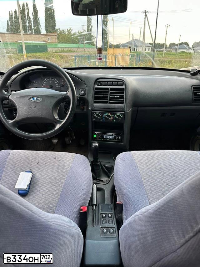 Фото автомобиля LADA 2112, 2007 — госномер Н307РХ702. Цвет: Белый