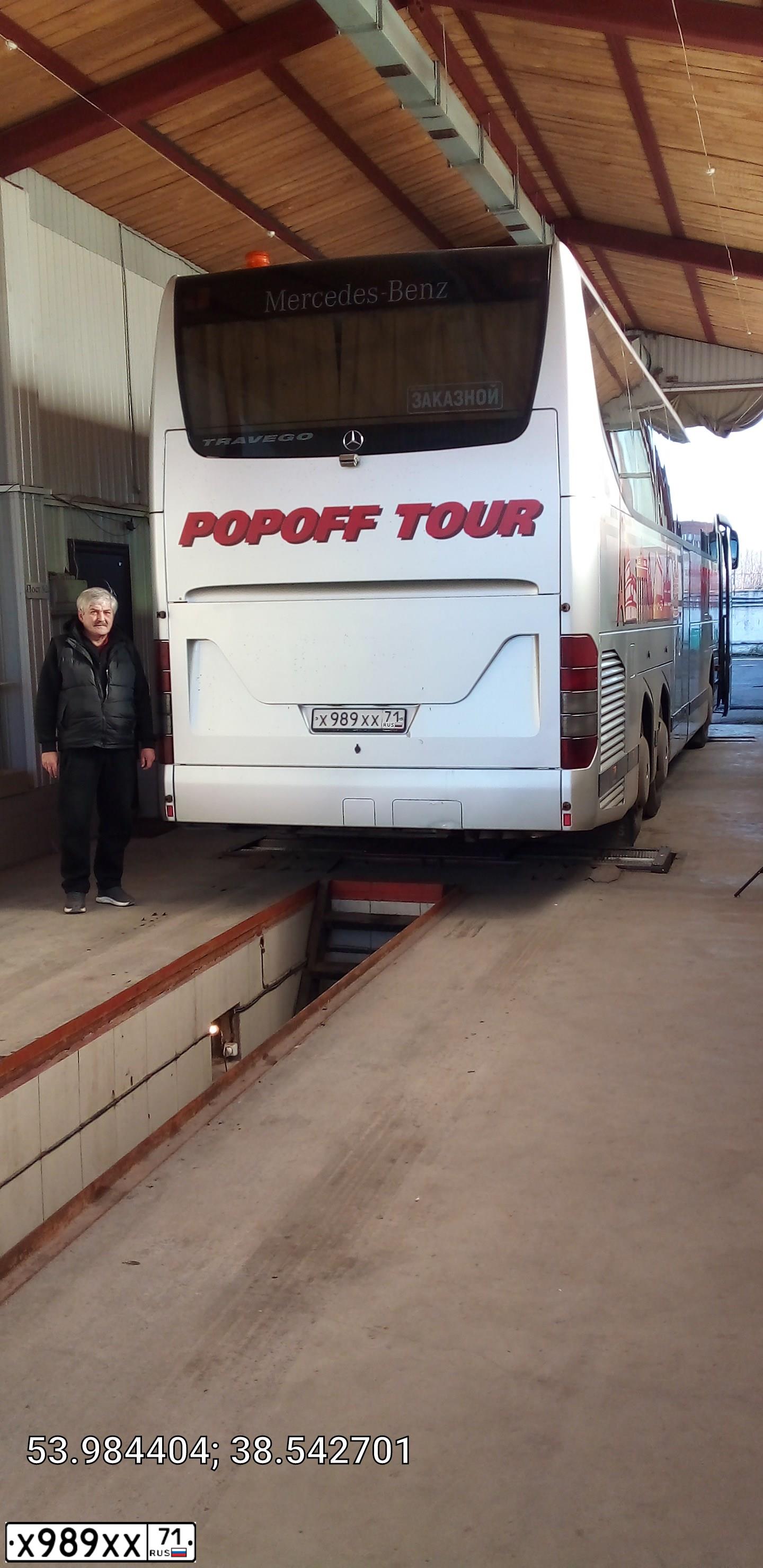 Фото автомобиля MERCEDES O 580 TRAVEGO, 2006 — госномер Х989ХХ71. Цвет: БЕЛЫЙ(СЕРЕБРИСТЫЙ