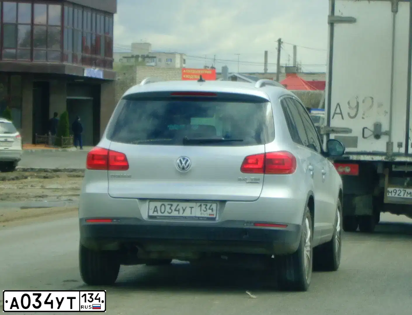 Фото автомобиля VOLKSWAGEN TIGUAN, 2013 — госномер А094УТ134. Цвет: ЧЕРНЫЙ