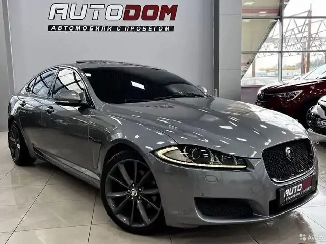 Фото автомобиля JAGUAR XF, 2013 — госномер К738УМ124. Цвет: СЕРЫЙ