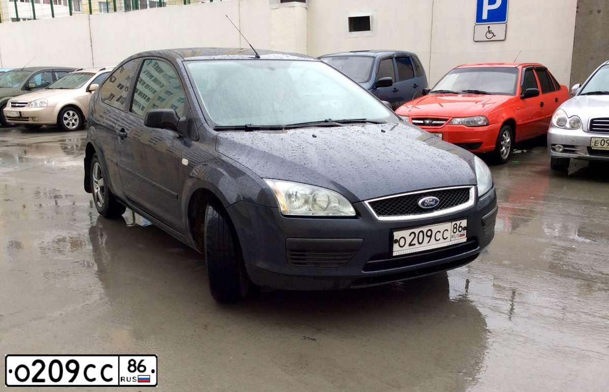 Фото автомобиля FORD FOCUS, 2006 — госномер А532НР702. Цвет: ТЕМНО-СЕРЫЙ