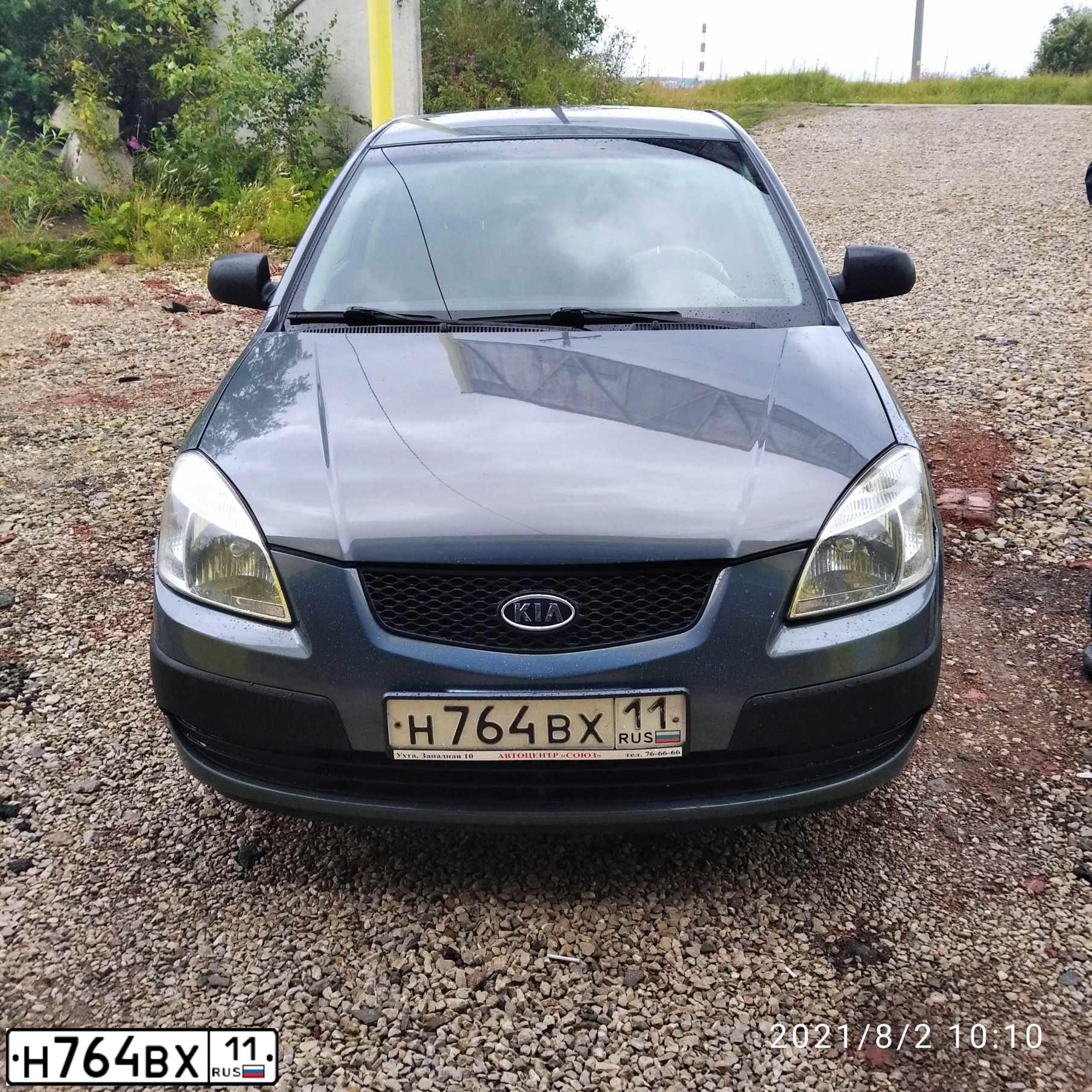 Фото автомобиля KIA RIO, 2007 — госномер Р871СЕ11. Цвет: ОЛИВКОВО-СЕРЫЙ