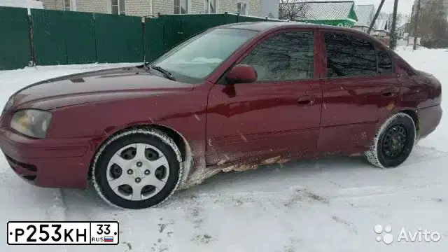 Фото автомобиля HYUNDAI I ELANTRA, 2001 — госномер Р253КН33. Цвет: ВИШНЕВЫЙ