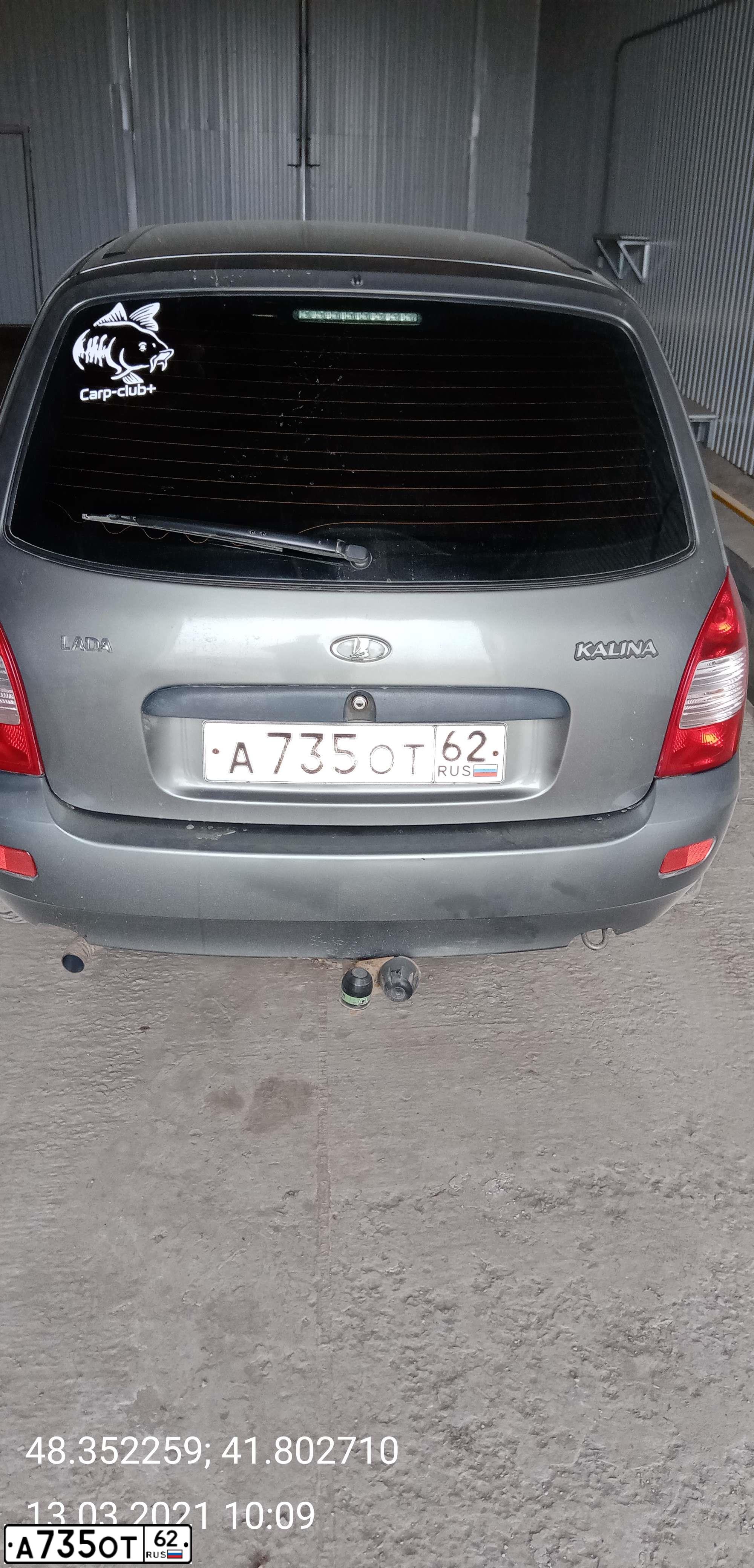 Фото автомобиля LADA 1117 KALINA, 2010 — госномер А735ОТ62. Цвет: Темно-серый металлик