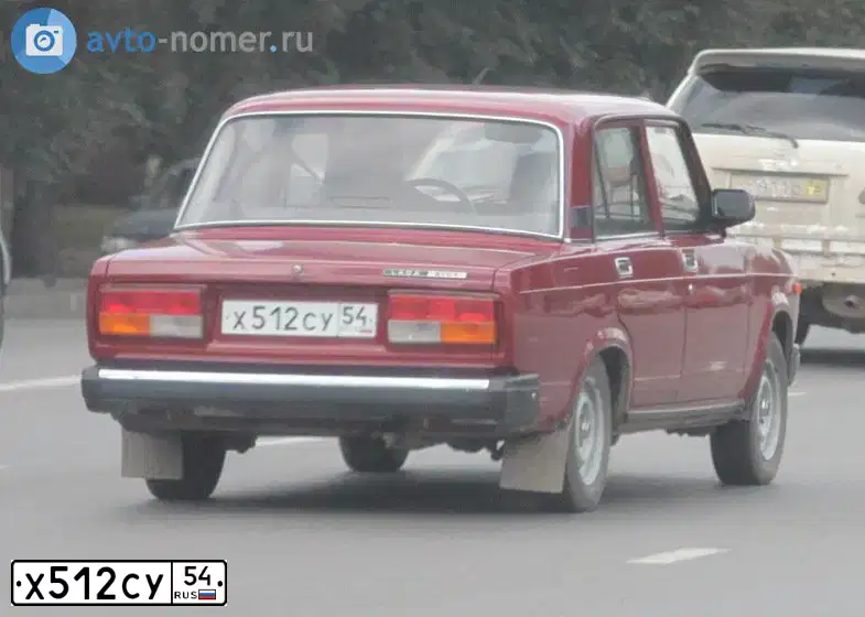 Фото автомобиля LADA 2107, 2007 — госномер Х512СУ54. Цвет: ВИШНЕВЫЙ