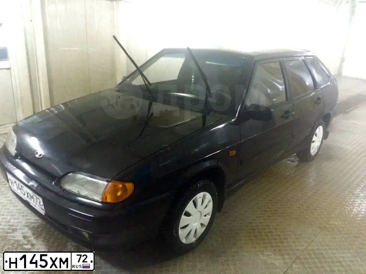 Фото автомобиля LADA 211440-26, 2011 — госномер Е719СР186. Цвет: СИНЕ-ЧЕРНЫЙ