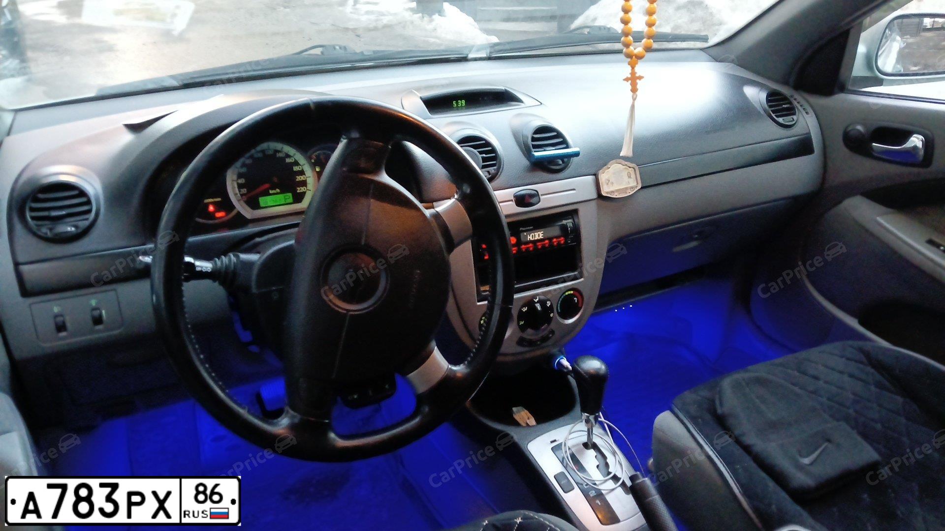 Фото автомобиля CHEVROLET LACETTI, 2007 — госномер Т987АЕ250. Цвет: ЗЕЛЕНЫЙ