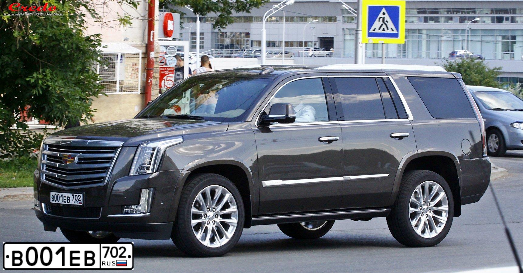 Фото автомобиля CADILLAC ESCALADE, 2020 — госномер В001ЕВ702. Цвет: Коричневый