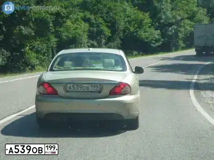 Фото автомобиля TOYOTA CAMRY, 2005 — госномер А539ОВ199. Цвет: БЕЖЕВЫЙ