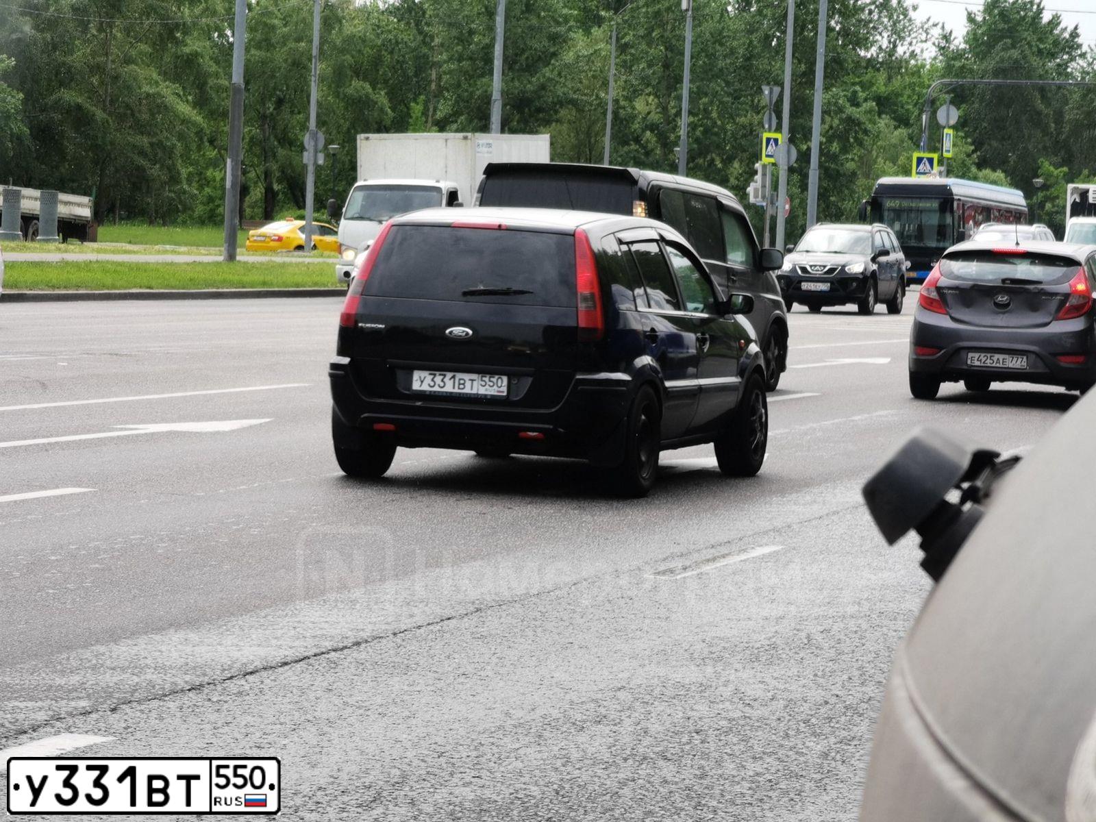 Фото автомобиля FORD FUSION, 2005 — госномер Т616ОТ198. Цвет: ЧЕРНЫЙ
