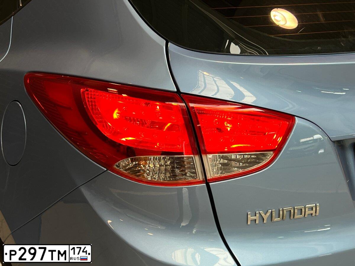 Фото автомобиля HYUNDAI IX35, 2012 — госномер К457КН774. Цвет: голубой