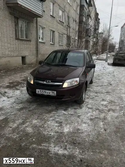 Фото автомобиля LADA 2190 GRANTA, 2013 — госномер Н197МЕ45. Цвет: ТЕМНО-ВИШНЕВЫЙ